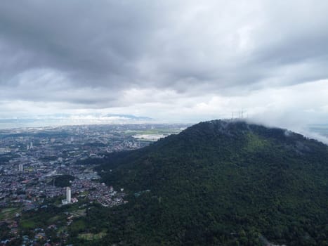 Aerial view residential area at Bukit Mertajam hill in misty day