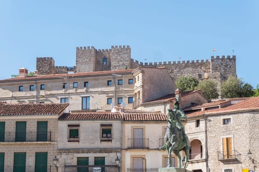 Panoramic view from Trujillo main square. Statue of Francisco Pisarro and Castle (Trujillo, Caceres, Spain).