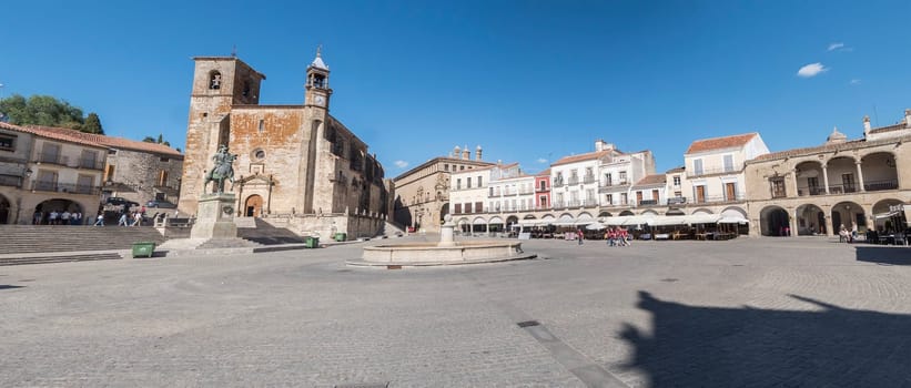 Panoramic view of Trujillo main square. Church of San Martin and statue of Francisco Pisarro (Trujillo, Caceres, Spain).