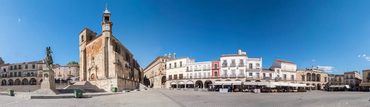 Panoramic view of Trujillo main square. Church of San Martin and statue of Francisco Pisarro (Trujillo, Caceres, Spain).