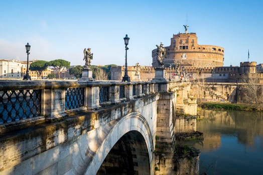 Saint Angel Castle and bridge over the Tiber river in Rome
