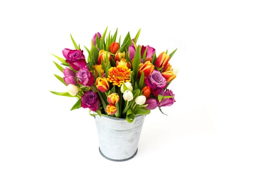 flowers in a bucket on white background