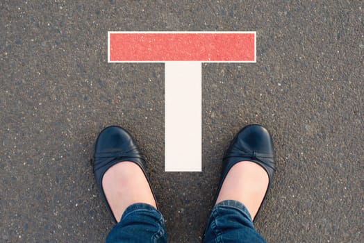 Standing in front of a dead end sign, burn out and depression, personal crisis, impasse of thoughts