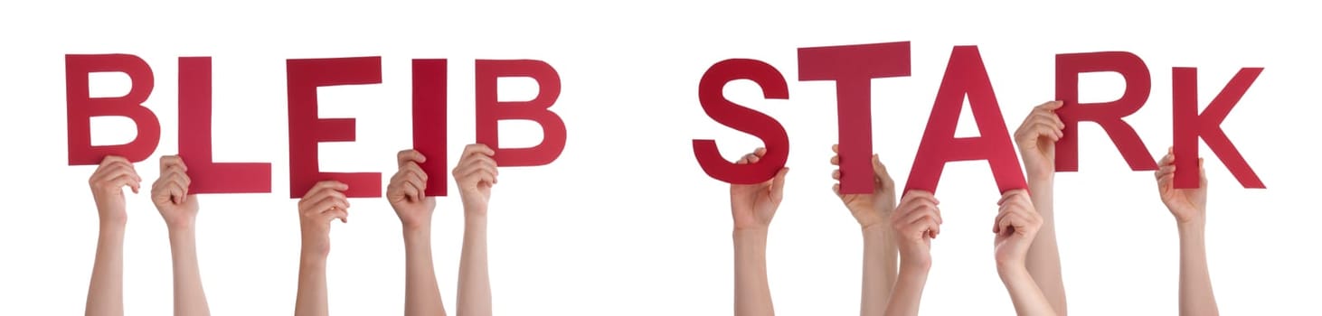 People Or Persons Hands Building German Word Bleib Stark Means Be Strong. Isolated White Background.