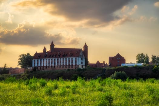 The Castle of the Teutonic Knights in Gniew at sunrise. Built in the 14th century and located near the Vistula River in Pomeranian Voivodeship, Poland