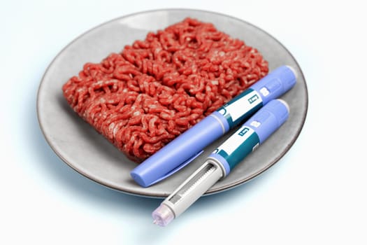 Ozempic Insulin injection pen and raw minced meat for diabetics