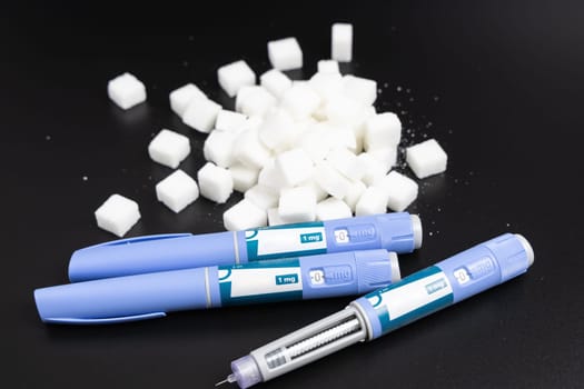 Ozempic Insulin injection pen on a dark background