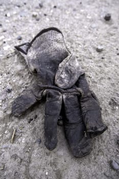 Detail of dirty and discarded work tool, contamination