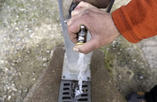 Detail of drinking water source for human consumption, hydration in the city