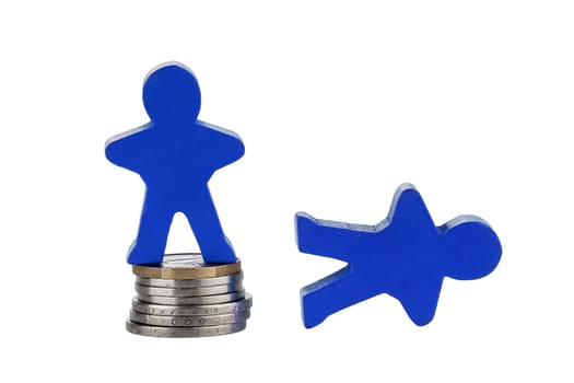 Wooden human figure on stack of coins for business concept