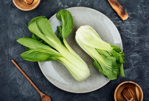 Fresh bok choy or chinese cabbage on the kitchen table