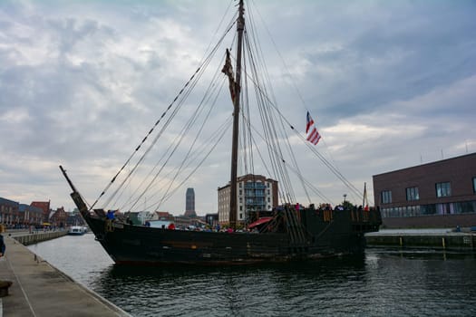 Wismar, Germany, September 10, 2022 - seaport and a Viking excursion ship in the historic Hanseatic city of Wismar, on the Baltic Sea coast Mecklenburg -Western Pomerania in Germany