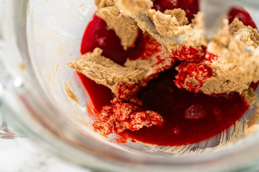 The creamed butter and brown sugar mixture, whipped until smooth and fluffy in the stand mixer. This creamy texture is essential for incorporating the rest of the ingredients smoothly.