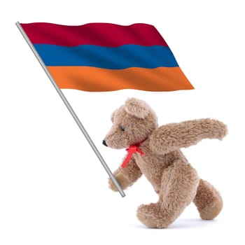 An Armenia flag being carried by a cute teddy bear