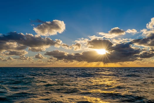 dreamlike sunset panorama on the open wide sea