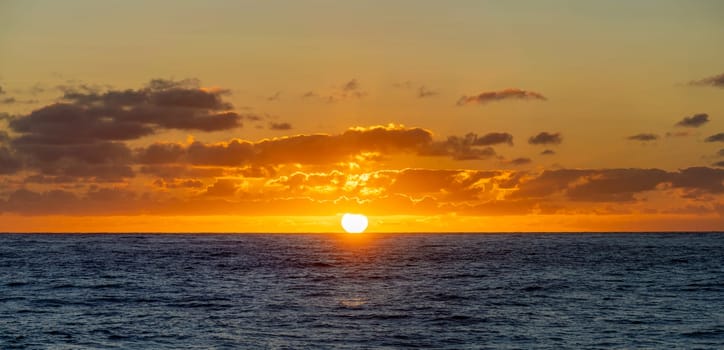 dreamlike sunset panorama on the open wide sea