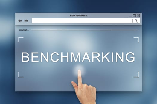 hand press on benchmarking button on webpage