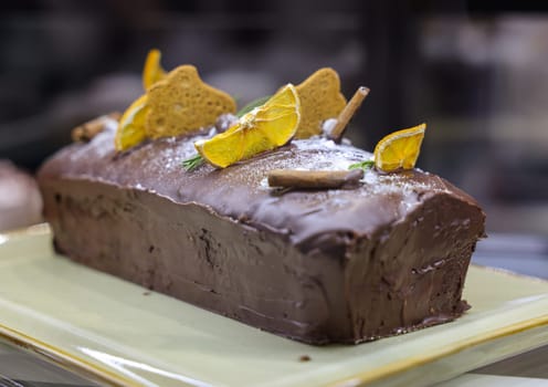 Chocolate cake decorated with dried fruit