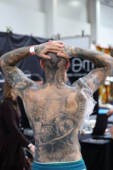 Krakow, Poland -  June 11, 2022: Unidentified  participant at 15th Tattoofest Convention in Cracow. One of the most prestigious tattoo festivals.