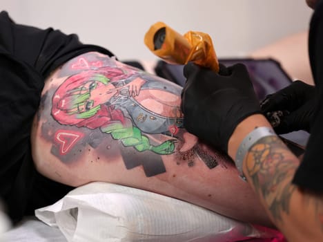Krakow, Poland -  June 12, 2022: Unidentified  participant at 15th Tattoofest Convention in Cracow. One of the most prestigious tattoo festivals.