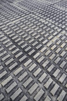 Detail of urban walkway floor decorated with cement
