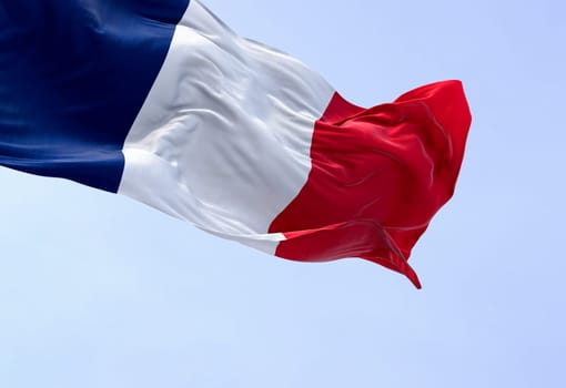 The national flag of France waving in the wind on a clear day. Tricolor of blue, white and red vertical stripes. EU state member. 3d illustration render. Fluttering textile