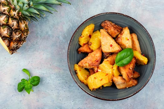 Deep-fried veggie tofu with pineapple and chili.
