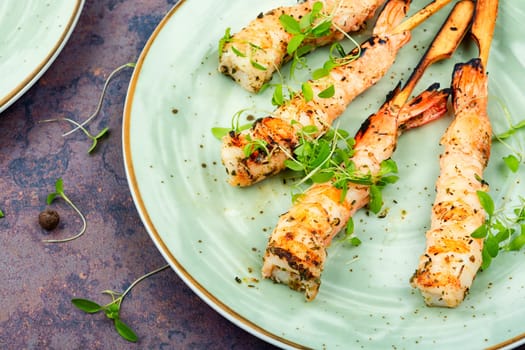 Shrimp barbecue, shrimps prawns skewers with herbs. Grilled shrimp