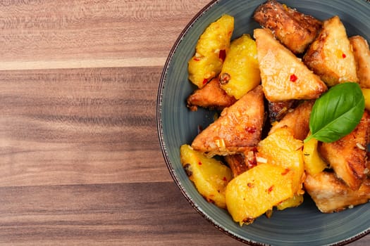 Deep-fried veggie tofu with pineapple and chili.