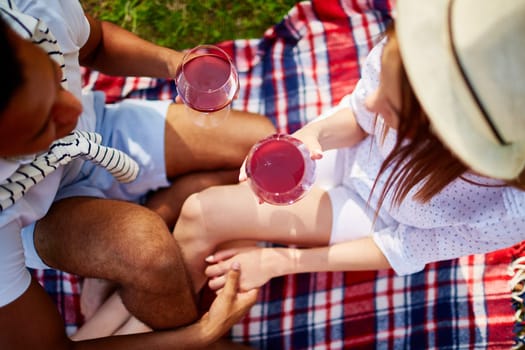 Young couple enjoying weekend with red wine
