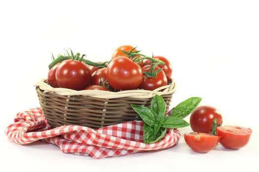 fresh tomatoes in a braided basket