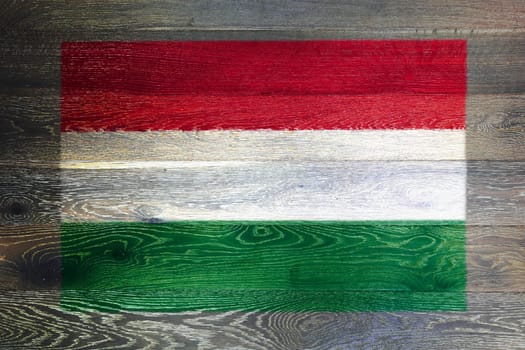 A Hungary flag on rustic old wood surface background