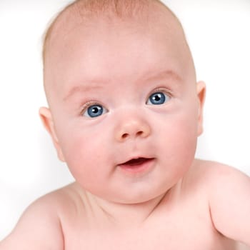 Cute baby boy with happy look on his face