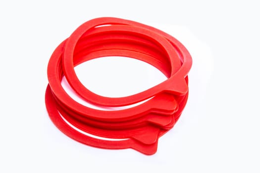 Red rubber rings for mason jars isolated on white background