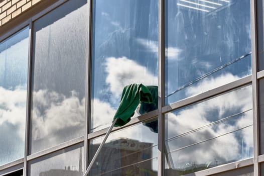 window washing, washing a street shop window. High quality photo