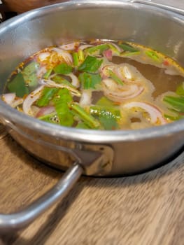 Sour spicy soup in hot pot, stock photo