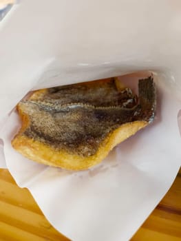 Crispy fried gourami fish Thai street food, stock photo