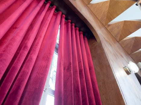 Maroon shiny cloth curtain material texture background, stock photo