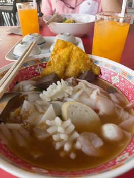Seafood pink tofu noodle soup, stock photo