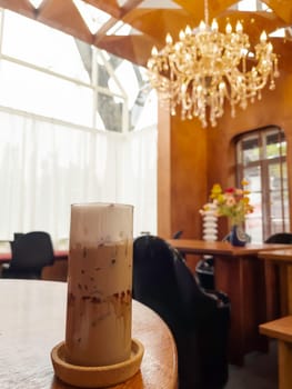 Iced coffee mocha on wooden table, stock photo