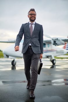 Happy businessman arrived from foreign country to meet with partners