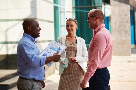 Business partners having meeting in urban environment