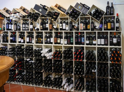 Montalcino, Italy - September 12, 2022: Interior of a wine shop in Montalcino ,Tuscany, Italy. Montalcino is famous for its Brunello di Montalcino wine.
