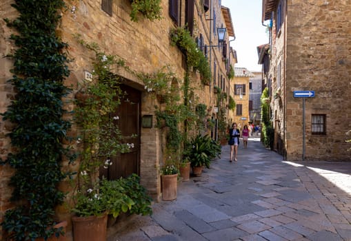 Pienza, Italy - Sept 12, 2022: Pienza, a tiny village in the Tuscany, known as the ideal city of the Renaissance and a capital of pecorino cheese. UNESCO World Heritage Site.