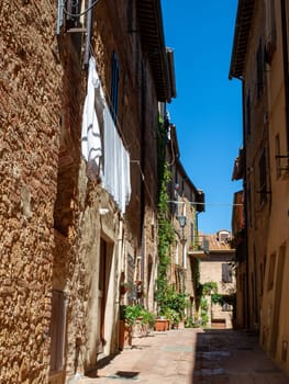 Pienza, Italy - Sept 12, 2022: Pienza, a tiny village in the Tuscany, known as the ideal city of the Renaissance and a capital of pecorino cheese. UNESCO World Heritage Site.