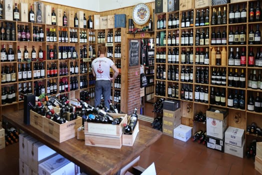 Montalcino, Italy - September 12, 2022: Interior of a wine shop in Montalcino ,Tuscany, Italy. Montalcino is famous for its Brunello di Montalcino wine.