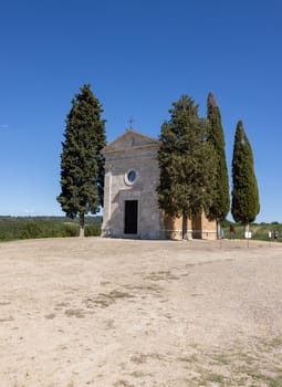 Pienza, Italy - September 12, 2022: Capella Di Vitaleta in countryside between San Quirico and Pienza in Val d Orcia Tuscany. Italy