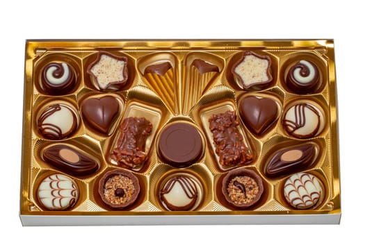 Closeup of box of fine chocolate candies in a beautiful plastic box isolated on a white background. Surprise gift for Valentine's Day, mothers day, birthday or other festivals.