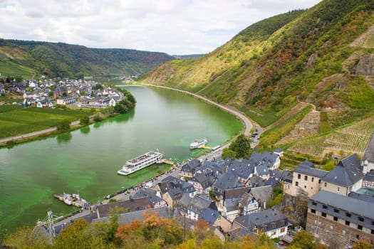 Aerial view of the Moselle valley with vineyards, the river Moselle and the villages Ellenz-Poltersdorf and Poltersdorf seen from castle Metternich in Beilstein, Rhineland-Palatinate, Germany.