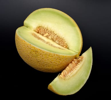 Galia melon,also known as net melon because of the structure on its yellow peel,has a white to green flesh. Galia melon,also known as the netted melon because of the structure on its yellow skin,has white to green